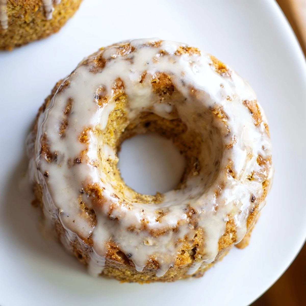 Moist Baked Banana Bread Donuts with a tender crumb and optional walnut topping, perfect for an American breakfast treat.