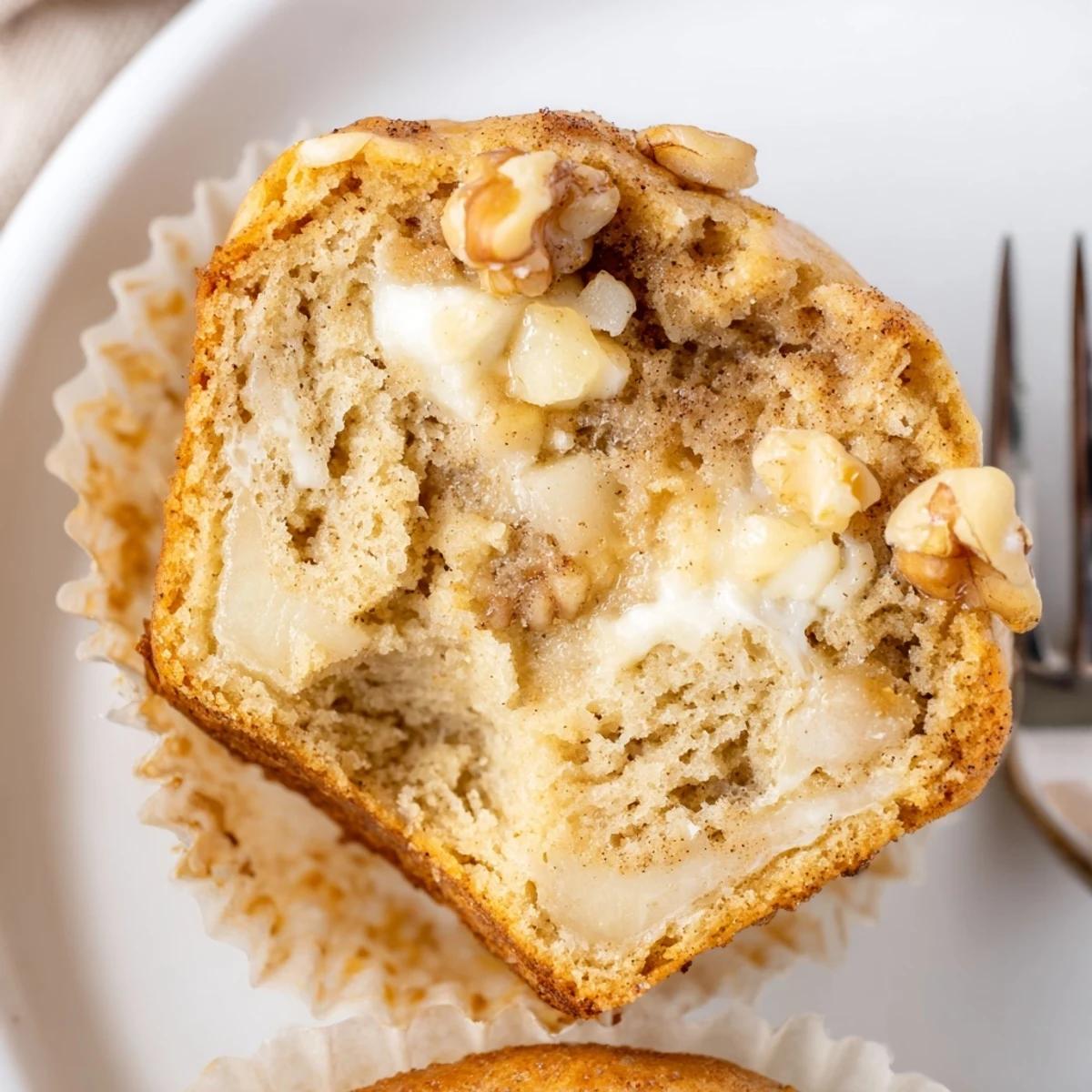 Healthy Apple Cinnamon Greek Yogurt Muffins with golden tops and warm cinnamon aroma
