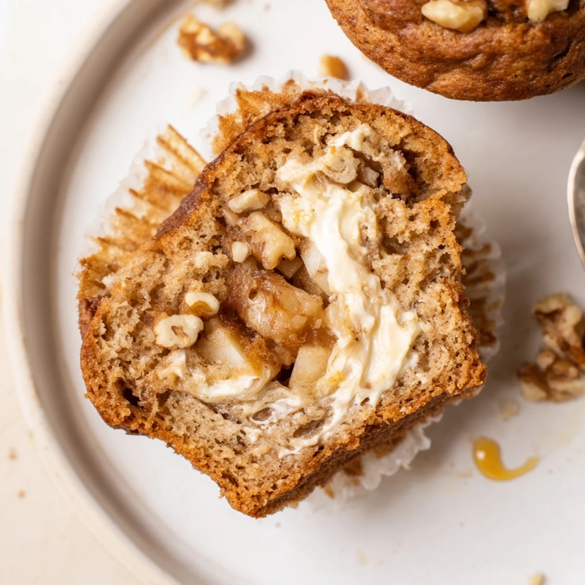 Warm, tender bite of Healthy Apple Cinnamon Greek Yogurt Muffins studded with apples