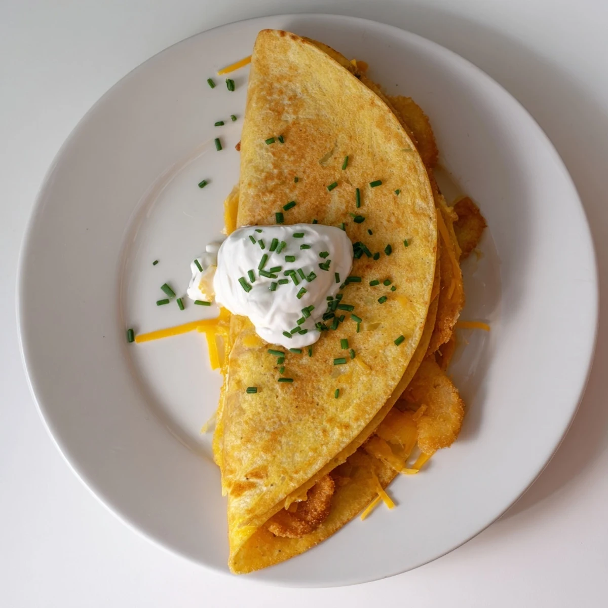 Crispy onion ring chips quesadillas featuring golden tortillas folded over bubbling melted cheese blend